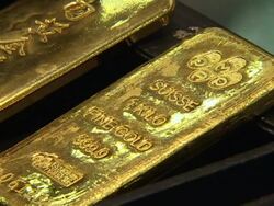 Gold bars on sale in a Beijing gold shop News Clip