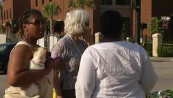 Charleston, SC residents expressed shock and grief Thursday after a man opened fire inside a historic black church the night before, killing 9 including the church's pastor. Mourners gathered at the site to lay flowers and pray. (June 18) Instructional Video
