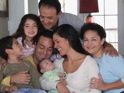 MS Portrait of Multi generational Family Sitting Together on Couch / Eastville, Virginia, USA Stock Footage