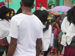 MS PAN Strange masks and costumes adorn dancers in Seenigama annual Perahera parade AUDIO / Sinigama, Southern Province, Sri Lanka Stock Footage