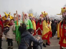 MS People dressed like god of longevity and god of wealth at temple fair to celebrate Chinese spring festival / xi'an, shaanxi, china Stock Footage