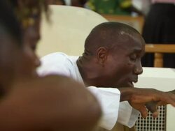 CU Shot of people praying in church / Lagos, Nigeria Stock Footage