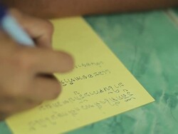 Children hand writing Stock Footage