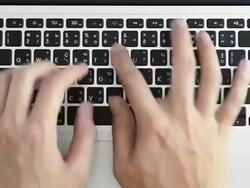 Typing on a Notebook Stock Footage