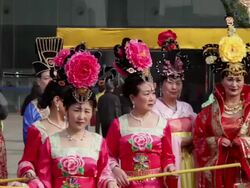 MS PAN People dressed in tang dynasty costumes takegroup photo during chinese spring festival / xi'an, shaanxi, china Stock Footage