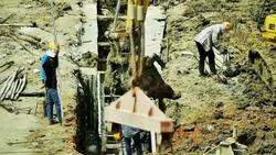 Construction workers at a building site Stock Footage
