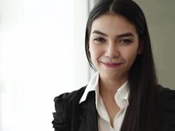 Portrait of young businesswoman in the office Stock Footage