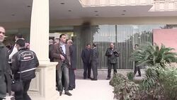 CLEAN : Cairo: shots fired against police guarding hotel no casualties News Clip