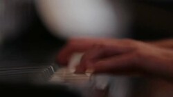 Woman playing piano close up shoot Stock Footage