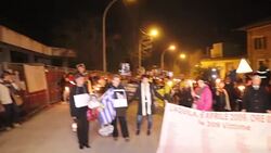 Torchlight procession for earthquake victims in L'Aquila Stock Footage