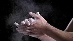 SLO MO Gymnast clapping chalky hands together Stock Footage