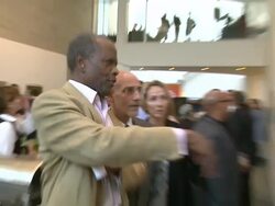 Sidney Poitier (L) at An Evening of Food and Fotos LA For Foundation Rwanda at the An Evening of Food and Fotos LA For Foundation Rwanda at Beverly Hills CA. (Footage by WireImage Video/GettyImages) Stock Footage