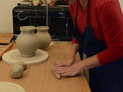 MS TU Shot of female potter shapes handle for pitcher at pottery / Landshut, Bavaria, Germany Stock Footage