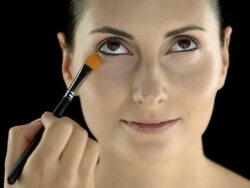 HD: Makeup Artist Reducing Dark Under-Eye Circles Stock Footage