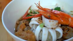 Asian seafood spicy noodle soup Stock Footage
