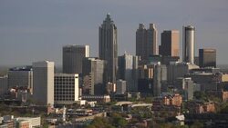 Elevated view over Interstate 85 passing the Downtown Atlanta skyline, Georgia, United States of America Stock Footage