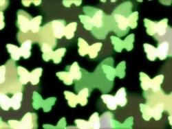 Defocused butterfly shaped candle lights. Stock Footage