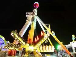 WS TS View of Amusement ride star shape stops  / Cologne, Germany Stock Footage