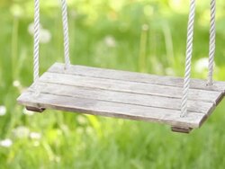 Lonely wooden swing Stock Footage