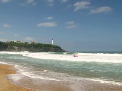 WS PAN View of people enjoying at beach / Biarritz, France Stock Footage