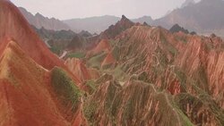View of roads passing through Zhangye Danxia Landform, China Stock Footage