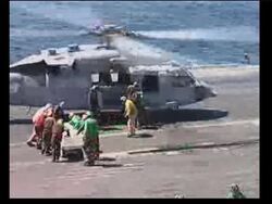 Videophone pictures of aid operation aboard US carrier News Clip
