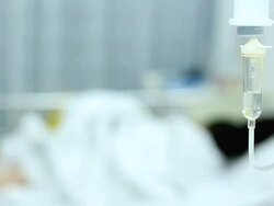 Patient in Hospital with Saline Solution Stock Footage