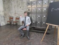 Teenage boy sitting in classroom and throwing paper airplane then paper airplanes are thrown at him Stock Footage