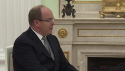 Russian President Putin meets Prince Albert, hands him Olympic torch News Clip