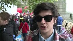 VOICED : Tens of thousands rally News Clip