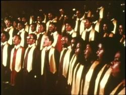 The Tuskegee Institute Concert Choir sings at a concert. News Clip