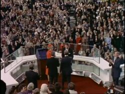 Former U.S. President Jimmy Carter shakes hands with U.S. President Ronald Reagan and his wife Nancy after Reagan's inauguration on January 20, 1981. News Clip