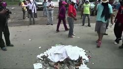 Protesters block roads, troops deployed for poll Instructional Video