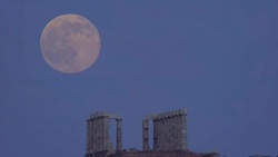 Stunning full moon rises over ancient temple in Greece Stock Footage