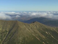 WS AERIAL ZI ZO PAN View of clouds on Mount Katahdin / Maine, United States Stock Footage