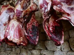 MS Shot of Meat hanging from hook in slaughter house in Namchee Bazarre / Namche, Nepal Stock Footage