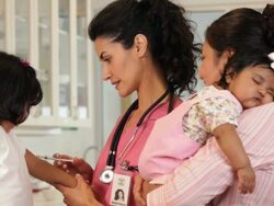 "hispanic medical worker giving a vaccination to a hispanic child patient/Richmond,Virginia, USA" Stock Footage