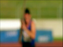 MS pole vaulter out of focus, running towards camera and into focus, Australia Stock Footage