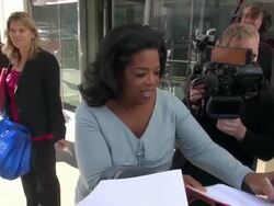 Oprah Winfrey signs for fans at CBS This Morning 0 Stock Footage
