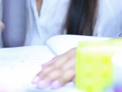 Scientist writing notebook in laboratory Stock Footage