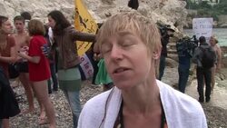 CLEAN: G20 protesters go for a dip News Clip