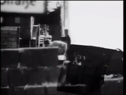 B/W 1961 people loading belongings onto truck as Berlin Wall goes up / East Berlin, Germany Stock Footage