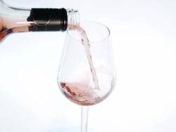 Slow Motion Wine Poured Into A Glass Stock Footage