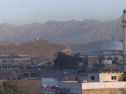 WS ZO Throngs of peiple and buildings of city at sundown  / Kabu,Kabul,Afghanistan Stock Footage