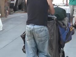 HD: Social Issues, Homeless Man Pushes Cart Stock Footage