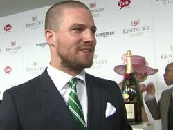 INTERVIEW - Stephen Amell talks about looking himself up online at  Moet & Chandon Toasts The 139th Kentucky Derby Stock Footage