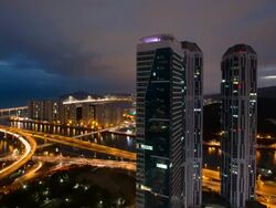 WS T/L View of Marine City Building and Gwangandaegyo Bridge / Busan, Busan, South Korea Stock Footage