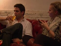 People Enjoying Cocktails in a Bar News Clip