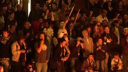 Anti-austerity protesters light fire outside Portuguese parliament News Clip