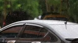 Hard Rain drops on a car roof Stock Footage